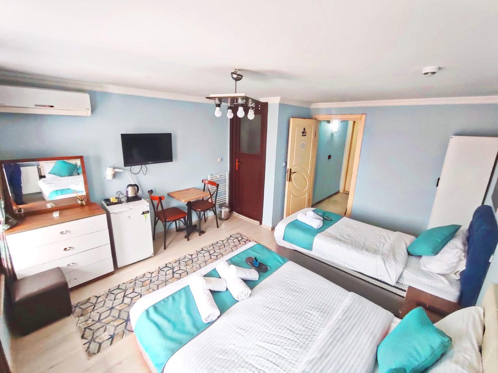 Deluxe Triple Room